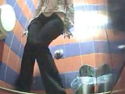 Beautiful and Teasing Blonde Babe in Bathroom Pissing