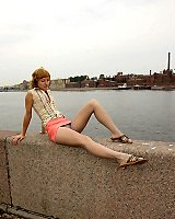 Sensuous Outdoor Upskirt Tease Performed By The Sweetie In Grey Pantyhose