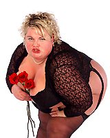 Stunning Bbw Milf Having Some Fun With Some Roses On Her Hot Naked Body