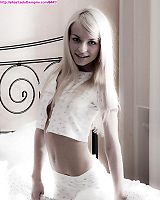 Blond Teen Poses In Tiny Shorts Spreads Her Pussy