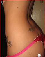 Tattooed Teen In Lingerie Undresses Home Made.