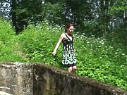 Redhead In Minidress Pissing In Forest