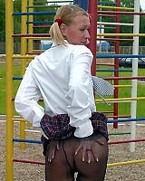 Pigtailed Blonde In Pantyhose Shows Ass Outdoor