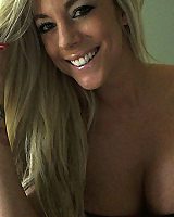 XoGisele Wears A Tight Leather Dress Undresses And A Micro Thong While She Has Some Fun With Handcuff