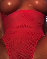XoGisele Rubs Hot Oil All Takes Her Hot Body And Takes Out Her Tight Fishnet Bodysuit
