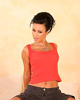 Chick with big Black Hair and Red Tank Top Poses Non Nude