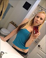 Cute Amateur Blonde With Piercing Posing In Bathroom
