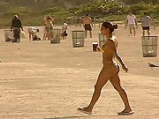 Phat Ass upskirt in little Thong masturbating on the nude Beach