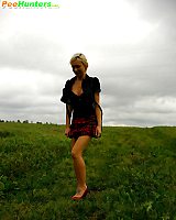 Gorgeous Busty Ponytailed Blonde Filmed Pissing On A Field