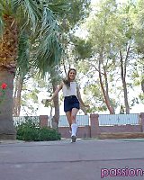Teen girl Lilly Ford heads outdoors in a short skirt for a flashing session