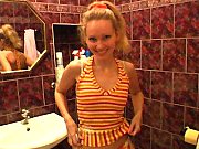 Blonde With Tiny Tits Pissing In Bathroom
