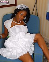 Ebony Transsexual Tart In Dress Bends Over On Leather Sofa