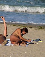 Two Nudists Showing Their Vacation Time On Untill The Wild Sandy Beach