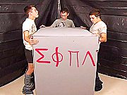 Fraternity Twink Sucks On Cocks From Inside Wooden Box