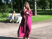 Seductive Exhibitionist Drops Her Coat in Park