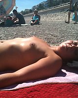 Beach Voyeur Shots Of A Suntanned Latina Sunbathing Topless