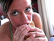 Sexy Brunette Poses In Bikini Eating Food
