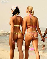 Ebony Girl In Tiny Bikini Lesbian Undresses On The Beach