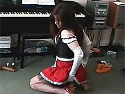 Gorgeous crossdresser Kirsty is wearing a pretty maids outfit and is enjoying sucking a group fuck orgy